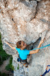 © Maygutyak - Woman practices in climbing at the rock in the Crimea mountains