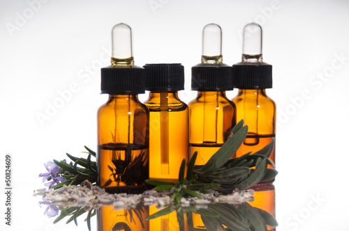 Fotografie, Obraz Essential oil with lavender and rosemary
