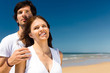 © Kzenon - couple on the ocean beach at summer vacation