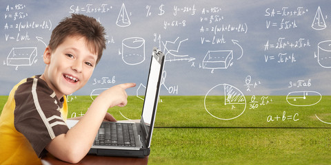young boy with laptop computer.