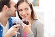 © pikselstock - Young couple drinking wine