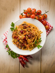 Wall Mural - pasta with fish ragout and hot chili pepper