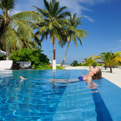 Wall Mural - Woman at poolside