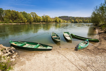 Five Boats On The River Bank
