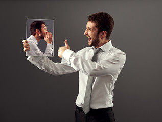 Wall Mural - young man agree with his inner voice