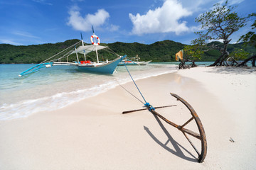 Wall Mural - The boat with the anchor on the beach