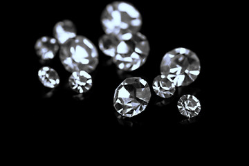 Poster - Beautiful shining crystals (diamonds), on black background