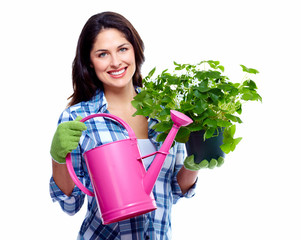 Gardening woman with plant.