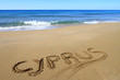 Cyprus written on sandy beach