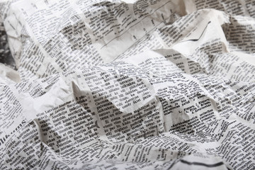 background of old crumpled newspaper