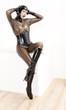 © Richard Semik - sitting woman wearing latex clothes