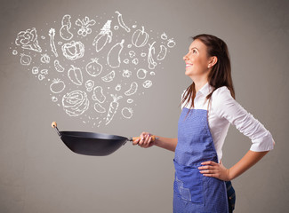 Wall Mural - Woman cooking vegetables