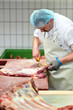 Metzger im Schlachthof // butcher in slaughterhouse