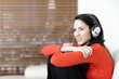 © Studio-FI - Woman listening to music