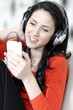 © Studio-FI - Woman listening to music