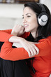 © Studio-FI - Woman listening to music