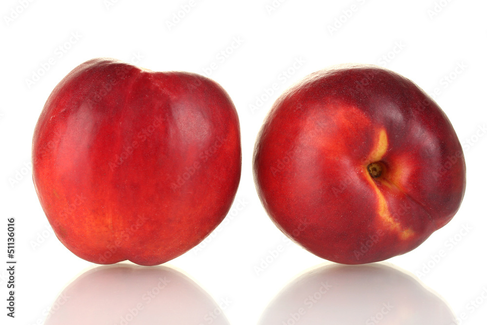 Ripe nectarines isolated on white close-up
