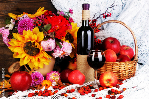 Obraz w ramie Colorful autumn still life with apples and and wine close-up