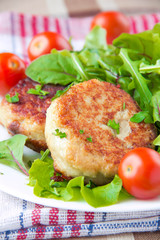 Grilled meat cutlet with a fresh green salad for dinner