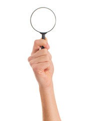 Wall Mural - Human Hand Holding Magnifying Glass