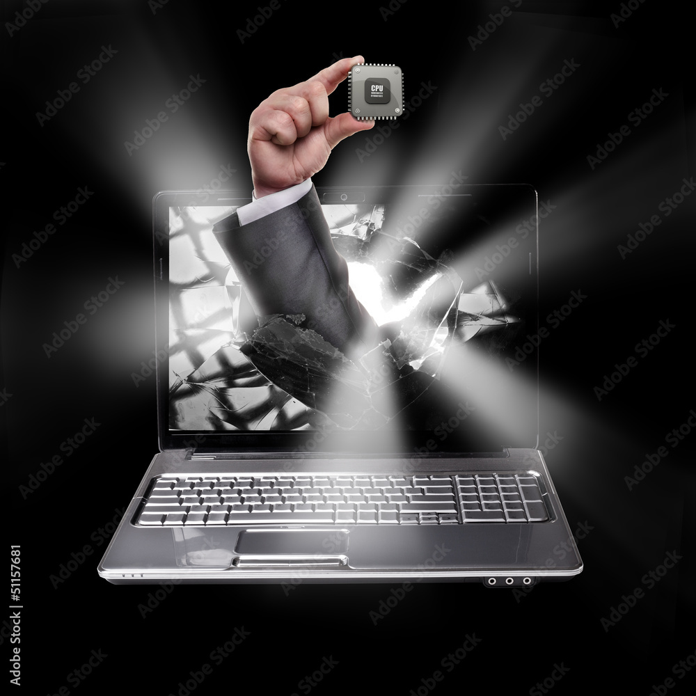 CONCEPT. laptop with broken screen and hand hand holds the processor CPU isolated on black background High resolution