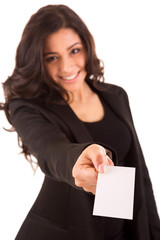 Wall Mural - Friendly woman holding a business card and smiling