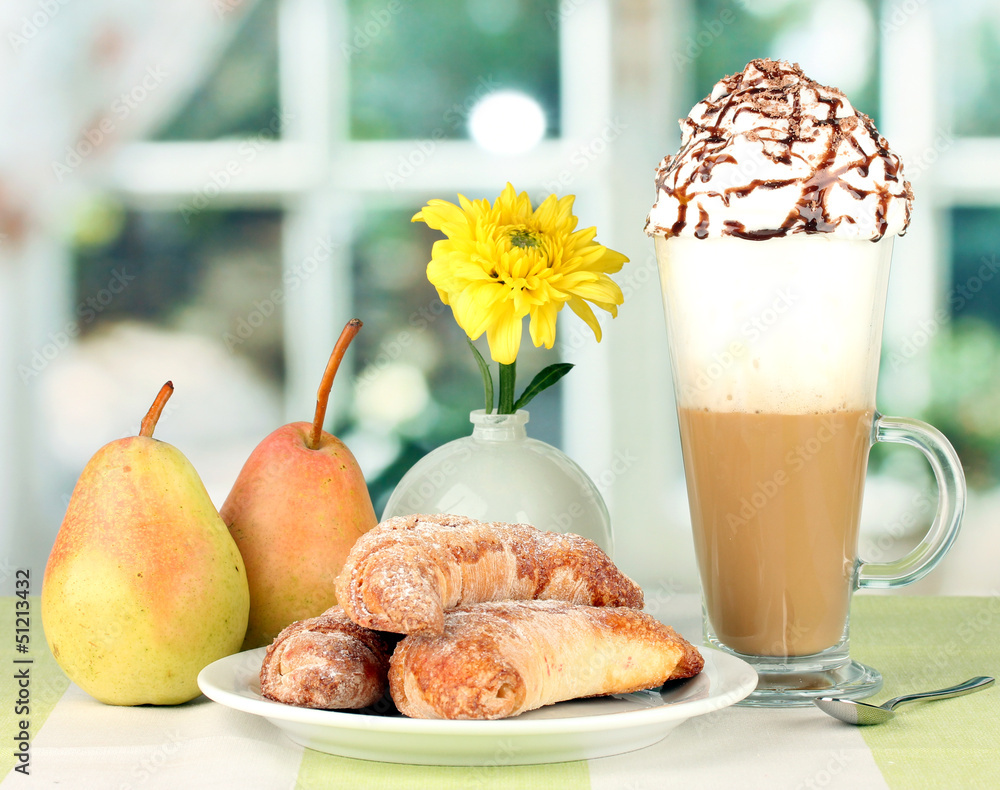 delicious bagels and fresh coffee on the table close-up