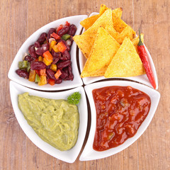 Wall Mural - bowl of assortment of dips and tortilla chips
