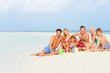 © Monkey Business - Multi Generation Family Having Fun On Beach Holiday
