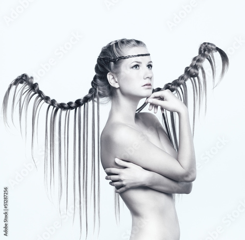 Fototapeta do kuchni Portrait of young woman with braid hairdo