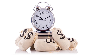 Wall Mural - Sacks of money and alarm clock on white