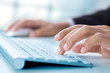 © Warakorn - Business hand touching computer keys during work
