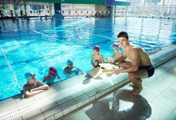 Wall Mural - happy children group  at swimming pool