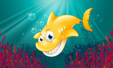 Sticker - A yellow shark smiling under the sea