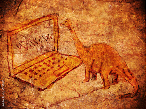 Fototapeta na wymiar prehistoric petroglyph with computer and dinosaur