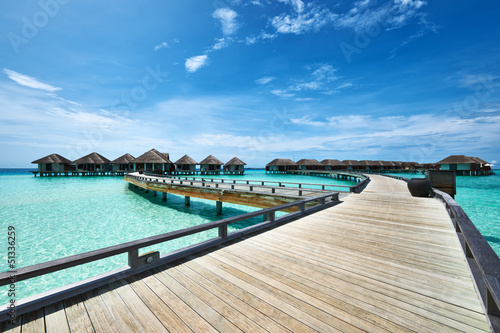 Obraz w ramie Beautiful beach with water bungalows