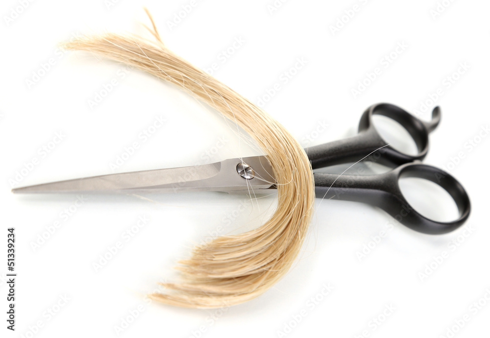 Pieces of hair cut with scissors isolated on white