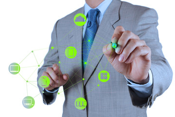 Businessman working with a Cloud Computing diagram on the new co