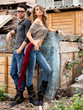 © matusciac - attractive fashionable couple wearing jeans posing dramatic