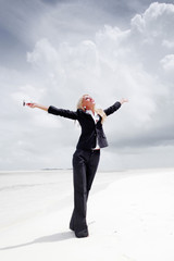 Wall Mural - happy business woman on the ocean coast