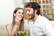 © Minerva Studio - Happy couple eating together