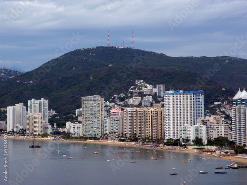 Fotografering Fancy Tall hotels line beach shore of Acapulco