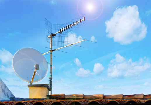 satellite antenna and sun