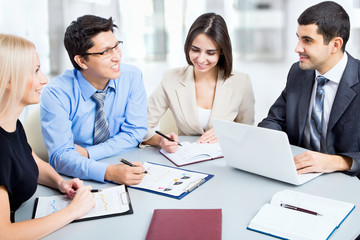 Wall Mural - Business people working at meeting