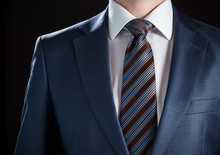 Elegant Businessman Wearing Formal Suit And Tie