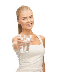 Poster - young smiling woman with glass of water