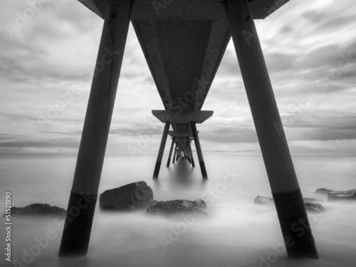 Fototapeta na wymiar Old pier in black and white