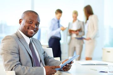 Canvas Print - Businessman with touchpad