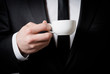 © slasnyi - business man with coffee cup