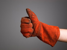 Hand Expressing Positivity With Welder Glove